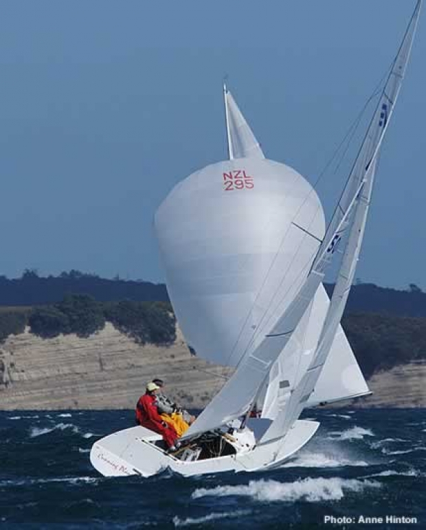 Mark Bradford (Australia), on the second beat of race 4, encounters Nathan Williams (New Zealand) heading downwind.