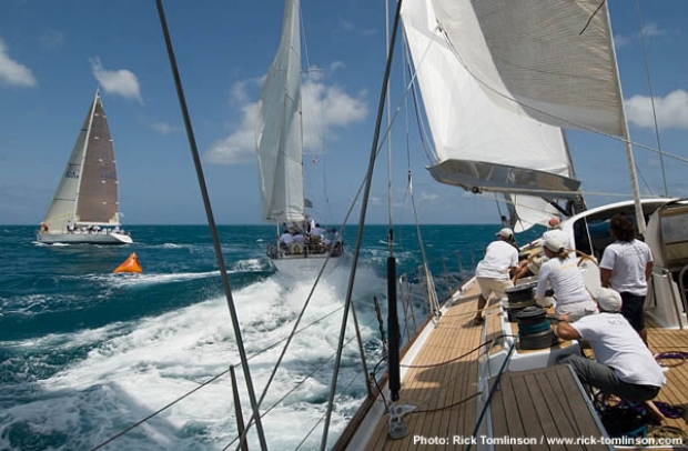 Setting up for a collison as Harrison's Farr 115 Sojana reaches the top mark